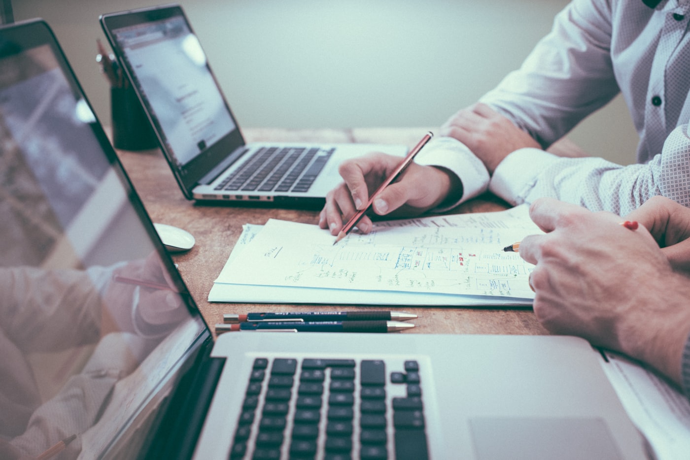 Team reviewing security and compliance documentation together